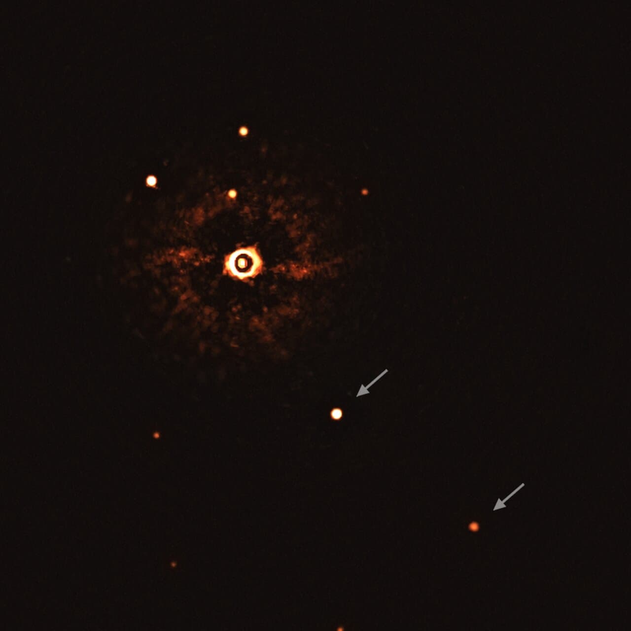 Image for ESO Telescope Captures First Direct Image of Two Exoplanets Orbiting a Sun-Like Star