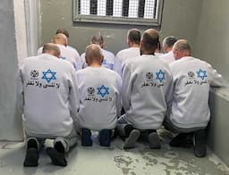 Israel Draws Condemnation After Forcing Released Palestinian Prisoners to Wear "Never Forgive, Never Forget" Apparel