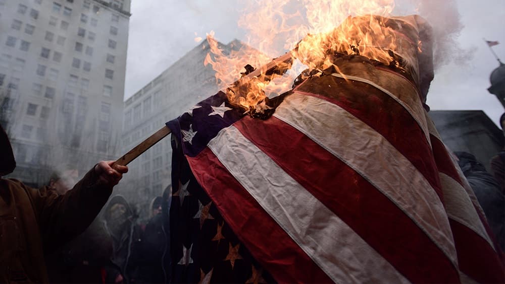 Image for Flag Burning Remains Constitutionally Protected Despite Executive Order, Sparking Renewed Debate on Free Speech Limits
