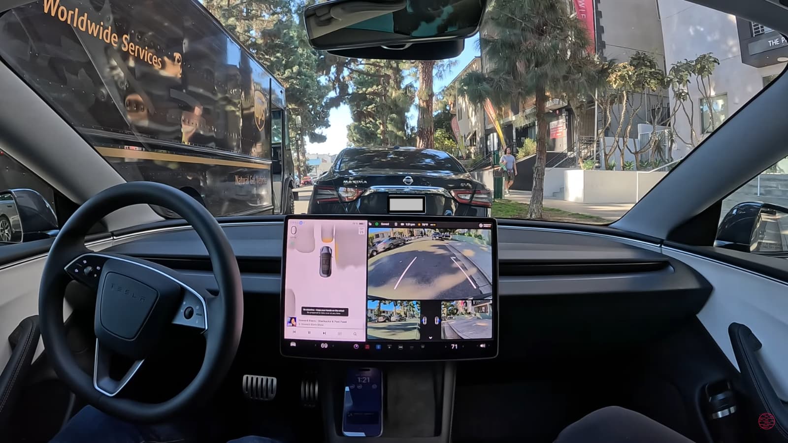 Image for Tesla's FSD 14 Advances, Shifting Steering Wheel Focus to Infotainment